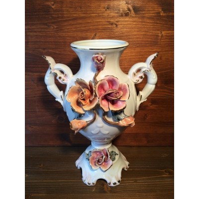 Porcelain vase with applied roses
