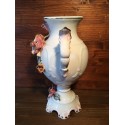 Porcelain vase with applied roses