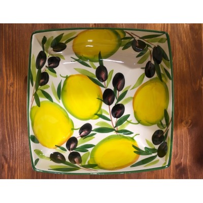 Bowl with lemon and olive decoration