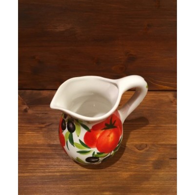 Pitcher with tomato and olive decoration